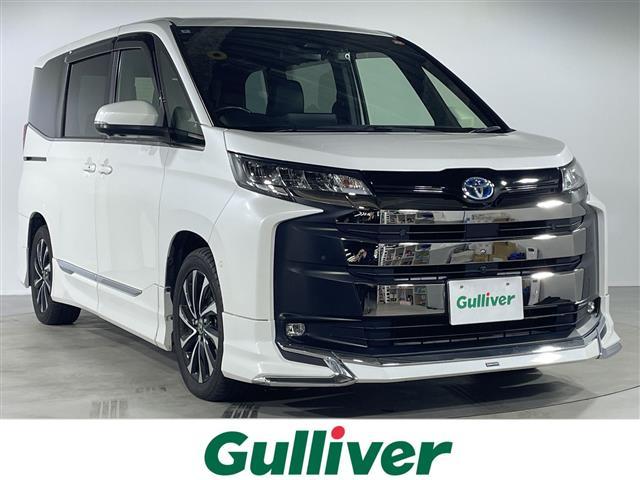 ノア(トヨタ) ハイブリッドＳ−Ｚ　純正１０．５インチメモリナビ　全方位モニター　モデリスタエアロ　トヨタアドバンスドパーク　フルセグテレビ　純正フリップダウンモニター　レーダークルーズコントロール　両側パワースライドドア　ＥＴＣ 中古車画像