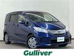 フリードハイブリッド ジャストセレクション メモリナビ/ワンセグテレビ/バックカメラ/クルーズコントロール/ドアバイザー/両側パワースライドドア/オートライト/パワーウィンドウ 中古車画像