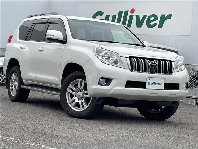 ランドクルーザープラド(トヨタ) ＴＺ−Ｇ　４ＷＤ／純正ナビ／ワンセグＴＶ／ＣＤ／ＤＶＤ／ＦＭ・ＡＭ／バックカメラ／パワーシート／メモリーシート／クルーズコントロール追従有／前方ソナー／ＥＴＣ／純正フロアマット／ドアバイザー 中古車画像