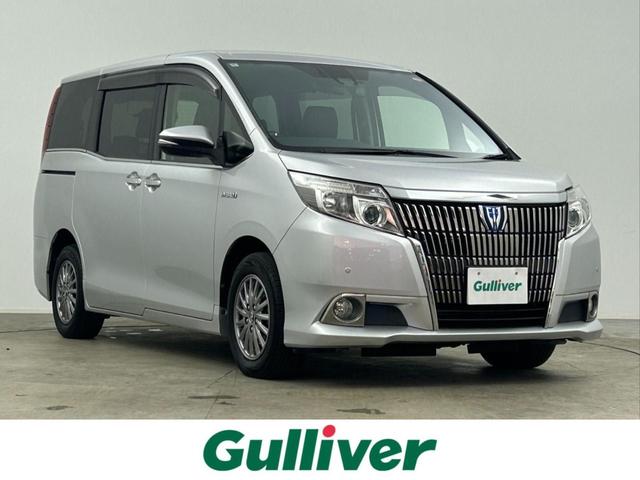 エスクァイア(トヨタ) ハイブリッドＧｉ　禁煙車　両側電動ドア　トヨタセーフティセンス　クルーズコントロール　純正９インチメモリナビ　フルセグＴＶ　Ｂｌｕｅｔｏｏｔｈ　レザーシート　ＤＮシートヒーター　純正１５インチＡＷ　ＬＥＤヘッドライト 中古車画像