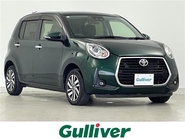 パッソ(トヨタ) モーダ　Ｇパッケージ　純正７インチナビ　ＡＭ　ＦＭ　ＣＤ　ＤＶＤ　ＳＤ　ＢＴ　ＵＳＢ　ワンセグ　バックカメラ　ビルトインＥＴＣ　Ｄ席シートヒーター　ＬＥＤヘッドライト　フォグランプ　前後コ−ナーセンサー　寒冷地仕様 中古車画像