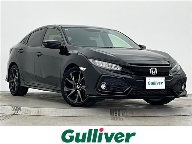 シビック(ホンダ) ハッチバック　Ｇａｔｈｅｒｓナビ　ＢＴ接続／フルセグＴＶ／ＣＤ／ＤＶＤ　ホンダセンシング　プリクラッシュセーフティ　路外逸脱抑制機能　アダプティブクルーズコントロール　オートハイビーム　純正１８インチＡＷ 中古車画像