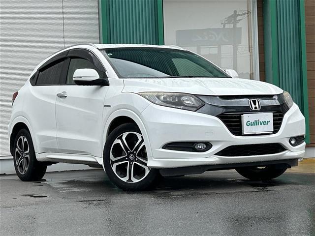 ヴェゼル(ホンダ) ハイブリッドＺ　禁煙車　衝突軽減ブレーキ　クルーズコントロール　Aftermarketメモリーナビ　フルセグ　ＢＴ　ＨＤＭＩ　バックカメラ　前側ドライブレコーダ―　ＥＴＣ　前席シートヒーター　電動パーキング　ＬＥＤヘッドライト 中古車画像