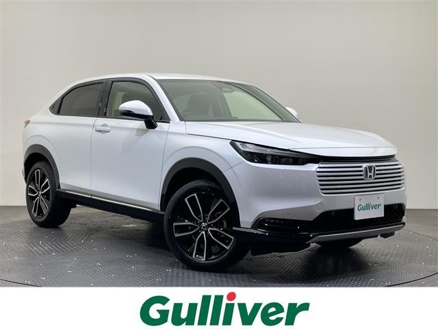 ヴェゼル(ホンダ) ｅ：ＨＥＶ　Ｚ　登録済未使用車　純正９型ナビ　バックカメラ　衝突被害軽減ブレーキ　ホンダセンシング　フルセグ　Ｂｌｕｅｔｏｏｔｈ　電動リアゲート　レーンアシスト　アダプティブクルーズコントロール　ＥＴＣ２．０　禁煙車 中古車画像