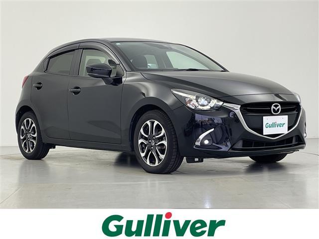 デミオ XDツーリング 純正ナビ バックカメラ パドルシフト クルーズコントロール 衝突軽減 ヘッドアップディスプレイ シートヒーター フォグランプ ETC オートライト LEDヘッドライト 電動格納ウィンカーミラー(1枚目)