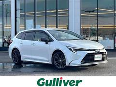 カローラツーリング ハイブリッド ダブルバイビー 純正ナビ(BT/DTV/FM/AM/フルセグ) 前席シートヒーター ステアリングヒーター オートライト ETC2.0 ステアリングスイッチ パーキングアシスト フォグランプ 電動格納ウィンカーミラー 中古車画像