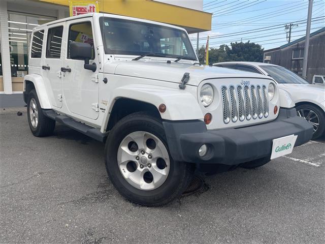 ジープ・ラングラーアンリミテッド(ジープ) サハラ　ダウンヒルアシストコントロール／クルーズコントロール／サイドカメラ／純正１８インチＡＷ／Aftermarketナビ（ＣＤ／ＤＶＤ／ＳＤ／ＢＴ／フルセグＴＶ）／ＥＴＣ 中古車画像