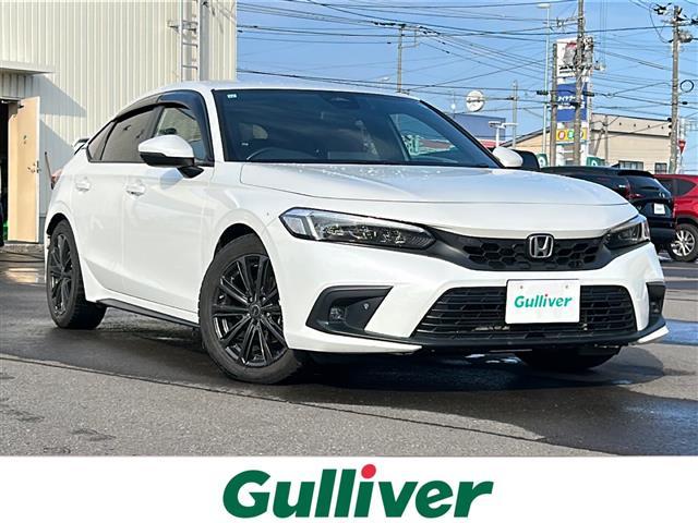 シビック(ホンダ) ＬＸ　／純正ナビＢＴ／フルセグ／ＵＳＢ／ホンダセンシング／ＣＭＢＳ／ＡＣＣ／先行車発進お知らせ／路外逸脱抑制システム／クリアランスソナー／レーンキープアシスト／ＢＳＭ／標識認識機能／革巻ステアリング 中古車画像