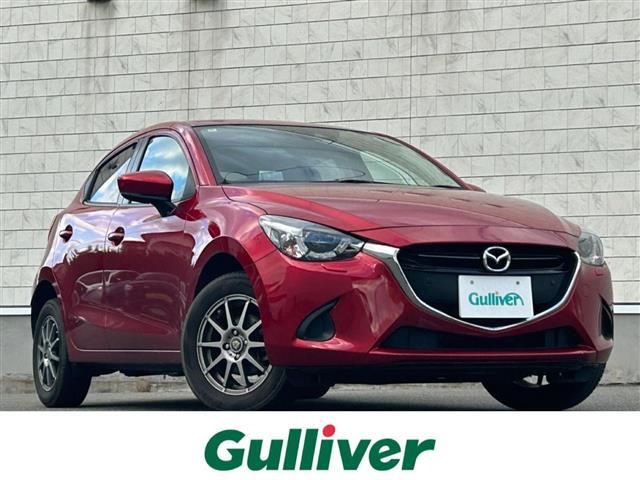 デミオ(マツダ) １５Ｓツーリング　４ＷＤ　純正ナビＦＭ／ＡＭ／Ｂｌｕｅｔｏｏｔｈ　スマートシティブレーキサポート　ＢＳＭシステム　車線逸脱防止装置　横滑り防止装置　バックカメラ　ＡＵＴＯライト　スペアキー　スマートキー　冬タイヤ積載 中古車画像