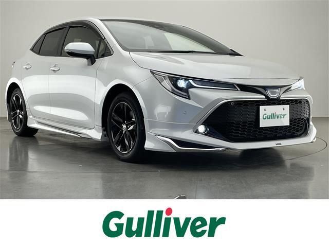 カローラスポーツ(トヨタ) ハイブリッドＧ　スタイルパッケージ　純正９型ナビＴＶ　ＤＶＤデッキ　モデリスタエアロ　シートヒーター　ハーフレザー　バックカメラ　純正ドラレコ　ＥＴＣ　セーフティセンス　衝突軽減装置　追従クルコン　コーナーセンサー　ＬＥＤオートライト 中古車画像