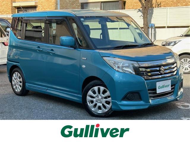 ソリオ(スズキ) ハイブリッドＭＸ　ワンオーナー／純正ナビ（Ｂｌｕｅｔｏｏｔｈ・フルセグ・ＤＶＤ・ＣＤ・ＳＤ・ＵＳＢ・ＡＭ・ＦＭ）／レーダークルーズコントロール／片側パワースライドドア／衝突軽減ブレーキ／車線逸脱抑制機能／ヒートシーター 中古車画像