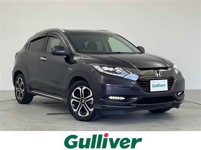 ヴェゼル(ホンダ) ハイブリッドＺ・ホンダセンシング　禁煙車／純正ナビ／フルセグＴＶ／バックカメラ／ＥＴＣ／ホンダセンシング／ＬＥＤヘッドライト／合皮＆スエード調コンビシート／専用内装（スエード調＋ブラウンステッチ）／無限フロアマット／無限ドアバイザー 中古車画像