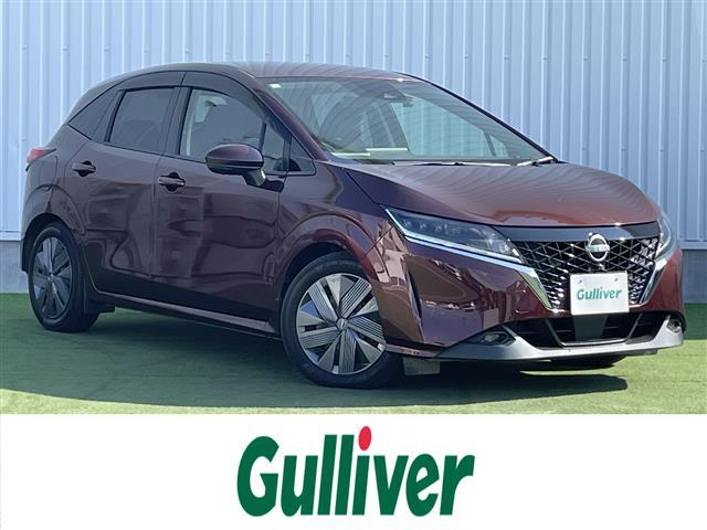 ノート(日産) Ｘ　禁煙車　純正９型ナビ　全方位カメラ　エマージェンシーブレーキ　レーンキープ　ソナー　ＢＳＭ　デジタルインナーミラー　前後ドラレコ　ビルトインＥＴＣ　置くだけ充電　電子パーキングブレーキ　スマートキー 中古車画像