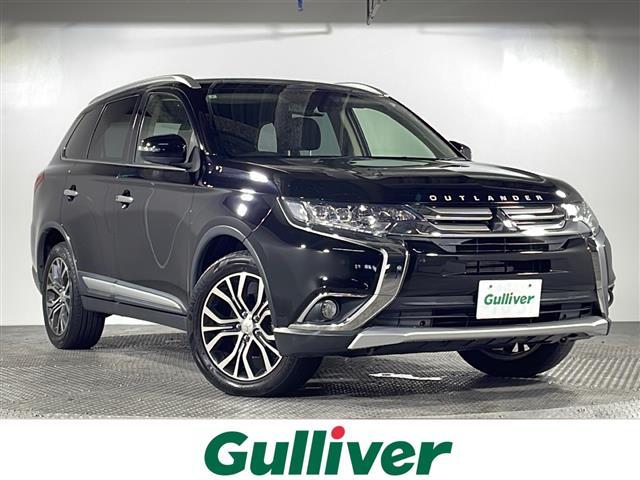 沖縄県の中古車ならアウトランダー ２０Ｇセーフティパッケージ　社外７インチナビ（ＢＴ，ＣＤ／ＤＶＤ，ＡＭ／ＦＭ）　７人乗り　クルーズコントロール　ルーフレール　ＥＴＣ　パドルシフト　フロアマット　純正１８インチアルミホイール　ＬＤＷ　ＦＣＭ　スペアキー