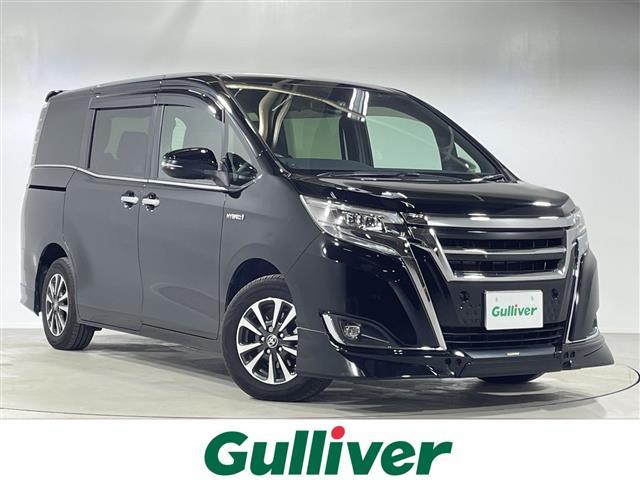 エスクァイア(トヨタ) ハイブリッドＧｉ　純正９インチナビ　セーフティセンス　両側パワースライドドア　クルーズコントロール　インテリジェントクリアランスソナー　シートヒーター　ＴＲＤフロントエアロ　ＥＴＣ２．０　バックカメラ　純正１５ＡＷ 中古車画像