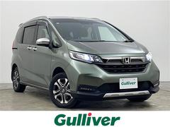 フリードハイブリッド ハイブリッド・クロスターホンダセンシング 4WD 社外SDナビ Bluetooth CD DVD フルセグ バックカメラ ビルトインETC クルーズコントロール 車線逸脱警報 後方コーナーセンサー 両側パワースライドドア 純正AW サンシェー 中古車画像