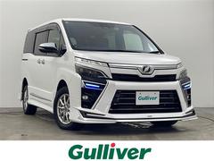 ヴォクシー ZS 煌II 純正ナビ 両側パワースライドドア フリップダウンモニター バックカメラ 寒冷地仕様 モデリスタエアロ プリクラッシュセーフティ クルーズコントロール ワイパーデアイサー オートハイビーム LEDライト 中古車画像