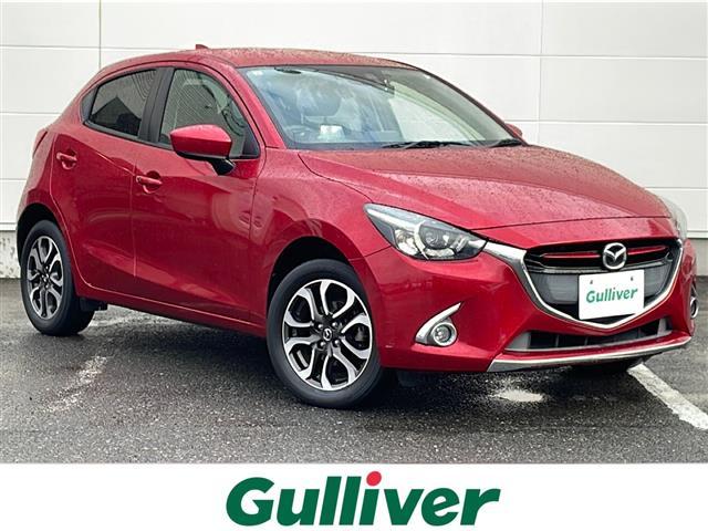 デミオ(マツダ) ＸＤツーリング　マツダコネクト　Ｂｌｕｅｔｏｏｔｈ　ビルトインＥＴＣ　バックＣ　黒革ステアリング　ステアスイッチ　クルコン　パドルシフト　オートＬＥＤライト　スマートキー　ドライブレコーダー　ヘッドアップディスプレイ 中古車画像