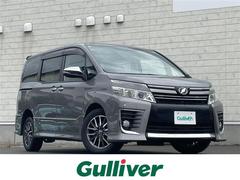 ヴォクシー ZS 煌 4WD 社外SDナビ Bluetooth アイドリングストップ クリアランスソナー 車線逸脱警報 横滑り防止装置 HIDヘッドライト 両側パワースライドドア バックカメラ フリップダウンモニター 中古車画像