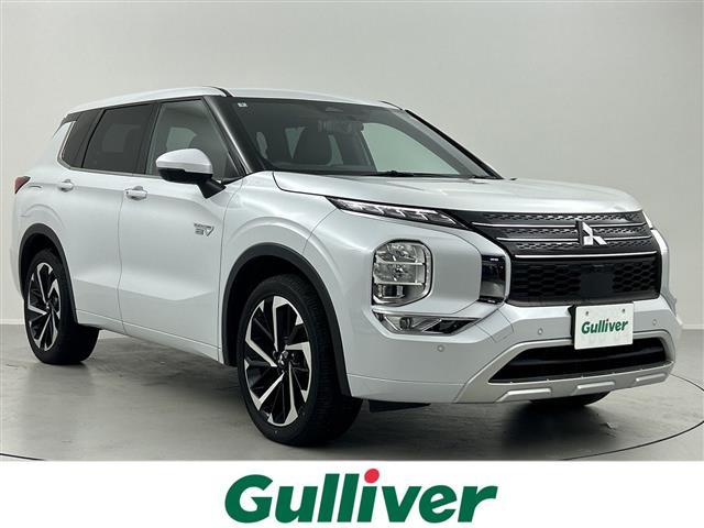アウトランダーＰＨＥＶ(三菱) Ｐ　禁煙車　全周囲カメラ　ＢＯＳＥサウンド　ＢＳＭ　ヘッドアップディスプレイ　ワイヤレス充電　レザーシート　シートヒーター　パワーバックドア　Aftermarketデジタルミラー　ステアリングヒーター　純正ナビ　スマホ連動 中古車画像