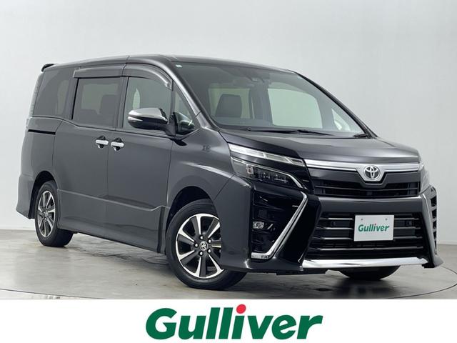 ヴォクシー(トヨタ) ＺＳ　煌ＩＩＩ　純正ナビ　バックカメラ　両側パワースライドドア　ビルトＥＴＣ２．０　純正ドライブレコーダー　オートマティックハイビーム　クルーズコントロール　衝突軽減システム　純正アルミホイール　純正フロアマット 中古車画像