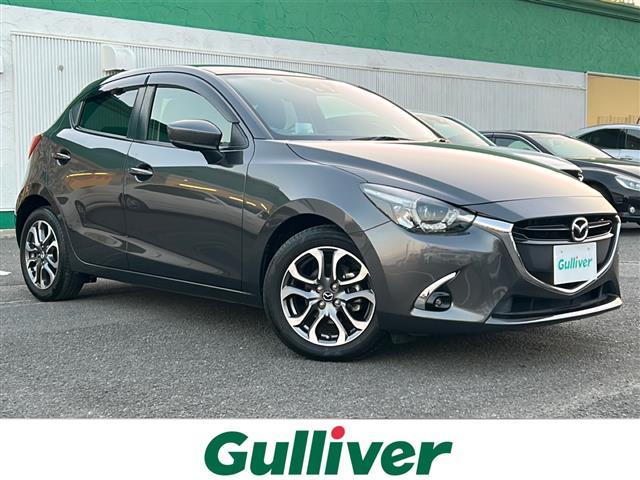 デミオ(マツダ) ＸＤツーリング　Ｌパッケージ　ターボ／純正ＳＤナビ／バックカメラ／シートヒーター／クルコン／パドルシフト／ＬＥＤヘッドライト／オートライト／ビルトインＥＴＣ／純正ＡＷ／純正フロアマット／プッシュスタート／スマートキー／スペアキー 中古車画像