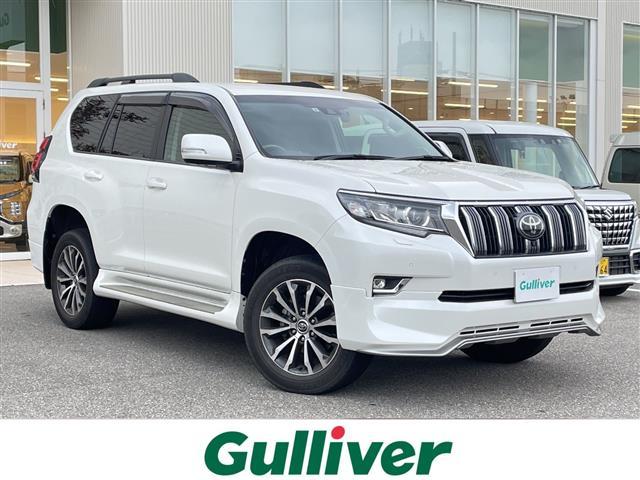 ランドクルーザープラド(トヨタ) ＴＸ　Ｌパッケージ　４ＷＤ　純正メーカーナビ　フルセグＴＶ　パノラマモニター　ＬＥＤヘッドライト　ＥＴＣ２．０　オプションアルミ　純正エアロ　黒革シート　シートヒーター＆クーラー　ガナドールマフラー　ドラレコ　保証書 中古車画像