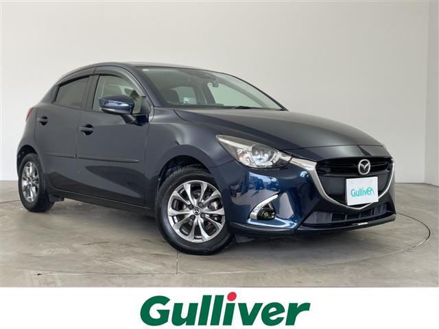 デミオ(マツダ) １３Ｓツーリング　マツダスピードエアロ（フロント）　スマートシティブレーキサポート　純正ナビ　バックカメラ　ＥＴＣ　ブラインドスポットモニター　ヘッドアップディスプレイ　シートヒーター　純正１５インチアルミホイール 中古車画像