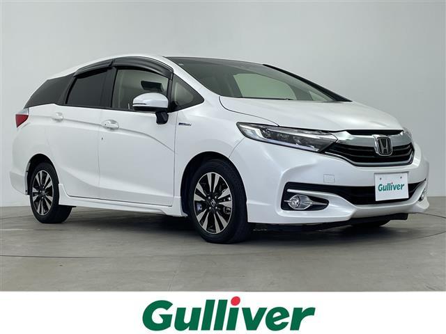 シャトル(ホンダ) ハイブリッド　ホンダセンシング　純正ＳＤナビ　レーダークルーズコントロール　レーンキープアシスト　パドルシフト　前席シートヒーター　ドライブレコーダー　ドアバイザー　ＬＥＤヘッドライト　ビルドインＥＴＣ　電格ミラー 中古車画像