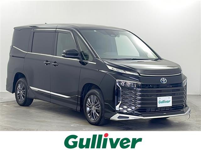 ヴォクシー(トヨタ) ハイブリッドＳ−Ｚ　禁煙車　純正ナビ　バックカメラ　モデリスタフルエアロ　レーダークルーズコントロール　前席シートヒーター　ステアリングヒーター　パワーバックドア　　ステアリングスイッチ　スマートキー　スペアキー　ＥＴＣ 中古車画像