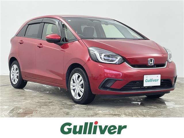 フィット(ホンダ) ｅ：ＨＥＶホーム　禁煙車　純正９型メモリナビ　ホンダセンシング　バックカメラ　Ｂｌｕｅｔｏｏｔｈ　フルセグＴＶ　コーナーセンサー　皮巻きステアリング　電子パーキング　ブレーキホールド　オートライト　ＬＥＤヘッドライト 中古車画像