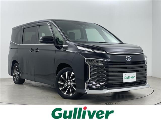 ヴォクシー(トヨタ) ハイブリッドＳ−Ｚ　１３．２型有機ＥＬ後席ディスプレイ　純正１０．５インチナビ機能付きディスプレイオーディオ　ＣＤ／ＤＶＤ　　バックカメラ　前後ドライブレコーダー　パワーバックドア　ビルトインＥＴＣ２．０　ＡＣ１００Ｖ 中古車画像