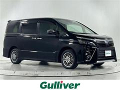 ヴォクシー ハイブリッドZS 煌 純正10.5インチナビ スマートキー スペアキー クルコン バックカメラ ETC 前後ドラレコ ウォークスルー 純正フロアマット シートヒーター 両側パワスラ 純正16インチAW 先行者発進告知機能 中古車画像