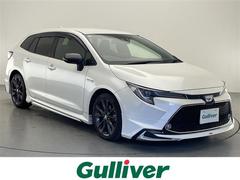カローラツーリング ハイブリッド ダブルバイビー 禁煙車 トヨタセーフティセンス モデリスタエアロ 純正9インチディスプレイオーディオ ナビ機能 バックカメラ ハーフレザーシート LEDヘッドライト ビルトインETC 前後ドライブレコーダー 中古車画像