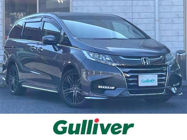 オデッセイ(ホンダ) Ｇ・エアロ　ホンダセンシング　７人乗り／ワンオーナー／純正エアロフロント・サイド・リア／純正１１．６インチフリップダウンモニター／純正９インチメモリナビ／バックカメラ／ＥＴＣ２．０／両側パワスラ／セカンドプレミアムクレードルシート 中古車画像