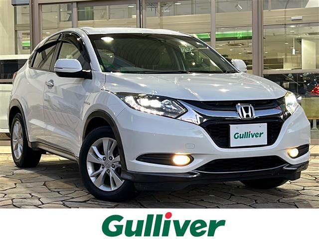 ヴェゼル(ホンダ) ハイブリッドＸ　Aftermarketナビ・衝突軽減・クルコン・バックカメラ・ＥＴＣ・ステリモ・電動パーキングブレーキ・オートホールド・ＬＥＤヘッドライト・オートライト・フォグランプ・純正アルミホイール・純正フロアマット・スマートキー 中古車画像