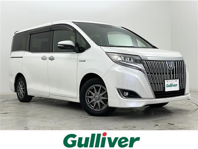 エスクァイア(トヨタ) ハイブリッドＧｉ　プレミアムパッケージ　禁煙車／フリップダウン／ＴＳＳ／クルコン／両側パワスラ／シートヒーター／純正ナビ／フルセグ／Ｂカメラ／ＥＴＣ／ステアヒーター／スマートキー／ＬＥＤヘッド／ＬＥＤフォグ／積み込み純正アルミ付き夏タイヤ 中古車画像