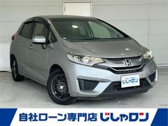 フィットハイブリッド Lパッケージ 本土仕入 純正ナビ TV Bluetooth接続 CD再生 バックカメラ 横滑り防止装置 衝突軽減ブレーキ クルーズコントロール 純正フロアマット ハーフレザーシート オートライト プッシュスタート 中古車画像
