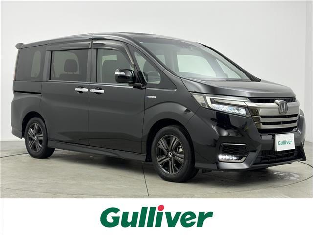 ステップワゴンスパーダ(ホンダ) スパーダハイブリッド　Ｇ・ＥＸ　ホンダセンシング　純正１０インチナビ　ＣＤ／ＤＶＤ　Ｂｌｕｅｔｏｏｔｈ接続　フルセグＴＶ　ＡｐｐｌｅＣａｒＰｌａｙ　マルチビューカメラ　ホンダセンシング　衝突被害軽減ブレーキ　アダプティブクルーズコントロール 中古車画像