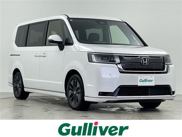 ステップワゴン(ホンダ) ｅ：ＨＥＶスパーダ　追従型クルーズコントロール　レーンキープアシスト　横滑り防止　衝突軽減ブレーキ　両側パワースライドドア　パワーバックドア　ＬＥＤヘッドライト　オートライト　オートマチックハイビーム　シートヒーター 中古車画像
