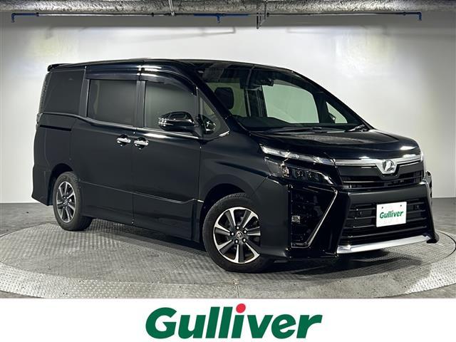 ヴォクシー(トヨタ) ＺＳ　煌ＩＩ　禁煙車　８人乗り　専用１１インチアルパインナビ【ＣＤ／ＤＶＤ／フルセグＴＶ／ＢＴ　１２インチフリップダウンモニター　バックカメラ　ドライブレコーダー　クルーズコントロール　　両側パワースライドドア 中古車画像