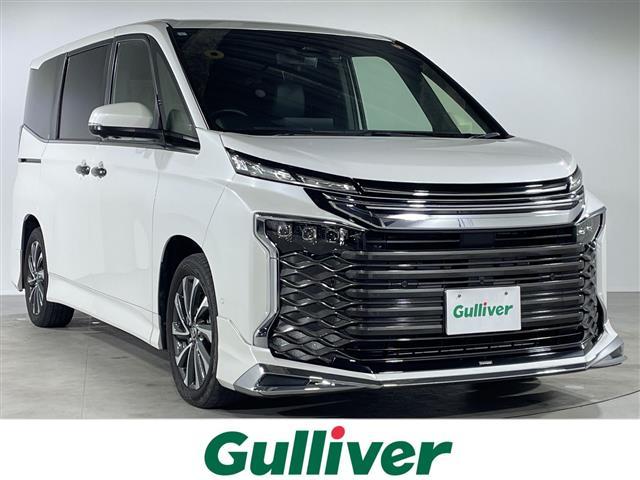 ヴォクシー(トヨタ) ハイブリッドＳ−Ｚ　純正ナビ（ＢＴ、フルセグ、ＣＤＤＶＤ、ＡＭＦＭ）モデリスタエアロ　全方位モニター　衝突被害軽減システム　レーンキープアシスト　レーダークルーズコントロール　フリップダウンモニター　両側パワースライド 中古車画像