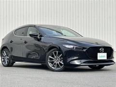 MAZDA3ファストバック 15Sツーリング 純正SDナビ(FM/AM/CD/DVD/HDMI/Bluetooth/フルセグTV)/全方位カメラ /前後ドラレコ/ETC/ワンオーナー/純正フロアマット/純正18インチAW/ステアリングスイッチ 中古車画像