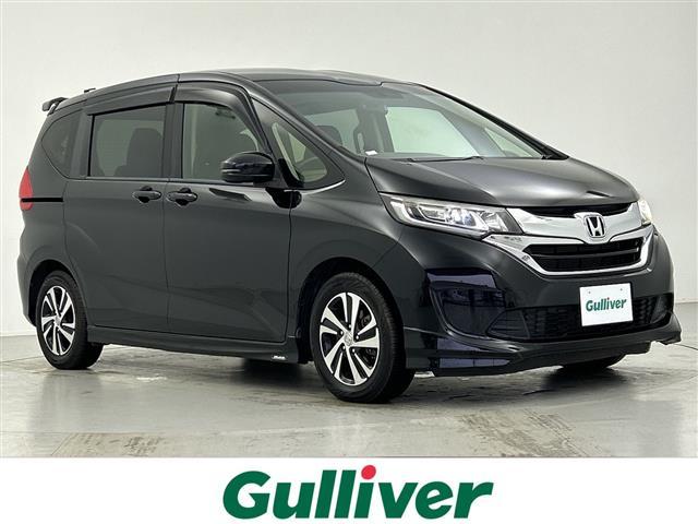 フリード(ホンダ) Ｇ　モデューロエアロ　純正ディスプレイオーディオ　バックカメラ　ＥＴＣ　アイドリングストップ　パワースライドドア　ウィンカーミラー　純正フロアマット　純正１５インチアルミホイール　純正ドアバイザー 中古車画像