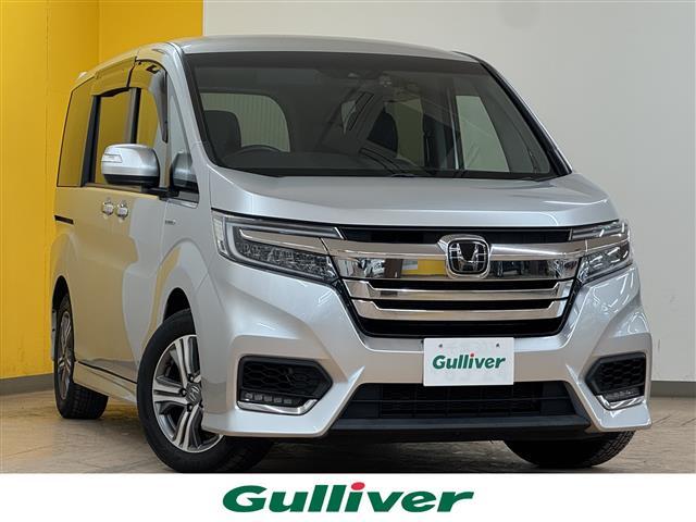 ステップワゴンスパーダ(ホンダ) スパーダハイブリッド　Ｇ・ＥＸ　ホンダセンシング　純正１０インチナビ　バックカメラ　両側電動スライドドア　フリップダウンモニター 中古車画像