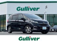 フリードハイブリッド ハイブリッド・Gホンダセンシング ホンダセンシング/純正ナビ/バックカメラ/ETC/両側パワースライドドア/オートライト/純正アルミホイール/AAC/クルーズコントロール/横滑り防止装置/2レーンキープアシスト 中古車画像