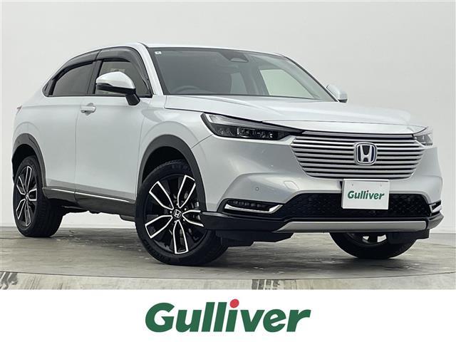 ヴェゼル(ホンダ) ｅ：ＨＥＶ　Ｚ　純正９型コネクトナビ　ＢＳＭ　パワーバックドア　アダプティブクルーズ　シートヒーター　ワイヤレス充電　ハーフレザーシート　ドライブレコーダー　ＥＴＣ２．０　ホンダセンシング　スマートフォン連携　禁煙車 中古車画像