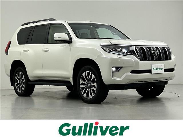 ランドクルーザープラド(トヨタ) ＴＸ　Ｌパッケージ　禁煙　純正ナビ　サンルーフ　アラウンドビューモニター　ＥＴＣ２．０　追従クルコン　電動格納サードシート　衝突軽減　レーンキープアシスト　クリアランスソナー　オートハイビーム　ブラインドスポットモニター 中古車画像