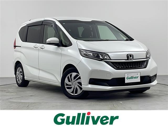 フリード(ホンダ) Ｇ　禁煙車／純正ナビ／ＡＭ／ＦＭ／ＣＤ／ＤＶＤ／ｉｐｏｄ／ＳＤ／ＵＳＢ／ＢＴ／ＡＵＸ／フルセグ／前席シートヒーター／両側パワースライドドア／ビルトインＥＴＣ／バックカメラ／ＬＥＤオートライト 中古車画像