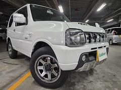 ジムニー クロスアドベンチャー 禁煙車 インタークーラー付きターボ 社外ナビ フルセグテレビ ETC 革巻きステアリング 合皮シート 前席シートヒーター 純正16インチアルミホイール リモコンキー 中古車画像